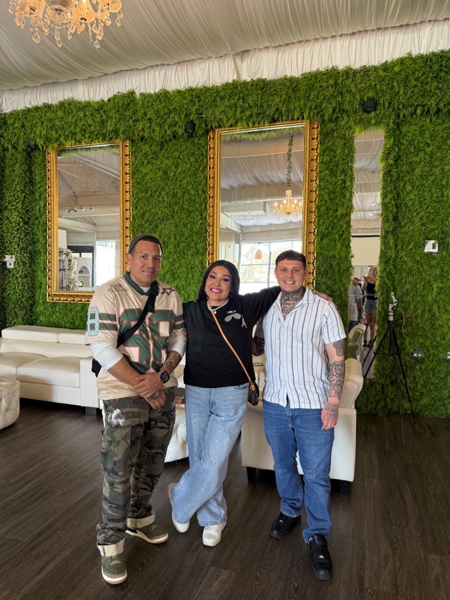 KD posing with fellow barbers at a networking event